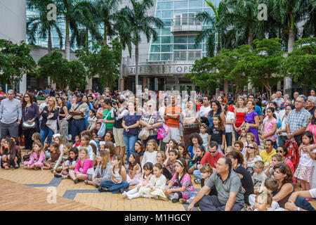 Miami Florida,Carnival Center,Thompson Plaza for the Arts,Free Multicultural Music Festival,festivals,celebration,fair,audience,crowd,watches performa Stock Photo