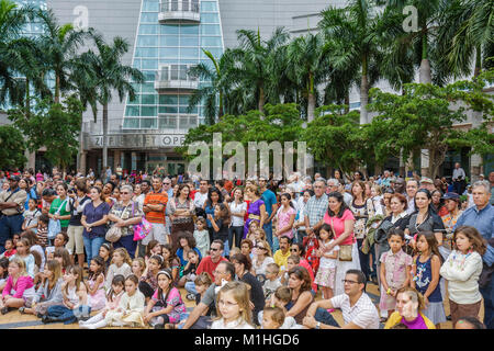 Miami Florida,Carnival Center,Thompson Plaza for the Arts,Free Multicultural Music Festival,festivals,celebration,fair,audience,crowd,watches performa Stock Photo