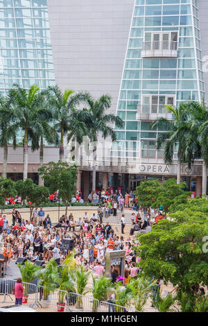 Miami Florida,Carnival Center,Thompson Plaza for the Arts,Free Multicultural Music Festival,festivals,celebration,fair,audience,crowd,watches performa Stock Photo