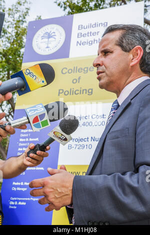 Miami Florida,College of Policing,groundbreaking ceremony,law enforcement,education,criminology,media,journalist,reporter,media,interview,interviews,i Stock Photo