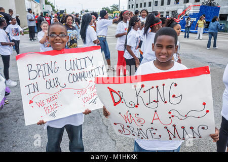 Miami Florida,Liberty City,Martin Luther King Jr. Parade,participant,community Black boy boys male kids children poster,FL080121003 Stock Photo