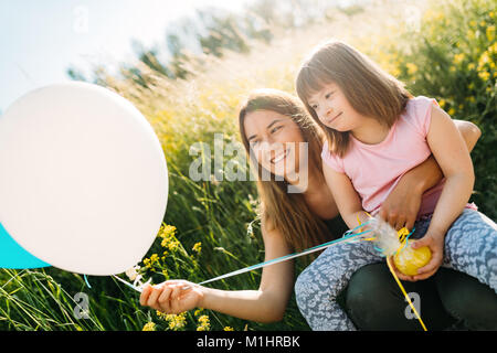 Picture of mother and child with special needs Stock Photo