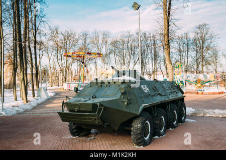 Vitebsk, Belarus. Soviet Armoured Personnel Carrier BTR-60 On Alley Of Military Glory In Victory Park In Sunny Winter Day. Stock Photo