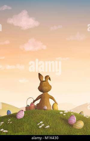 A cute Easter bunny sitting on a hill surrounded by easter eggs. Stock Photo