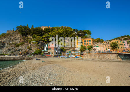 The colorful fishing village of Monterosso al Mare, Cinque Terre Italy with it's sandy beach, fishing boats and colorful homes on the sea Stock Photo
