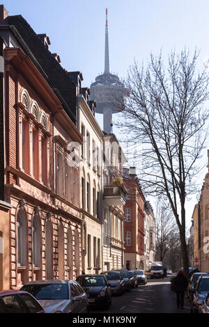 Germany, Cologne, houses at the Christian-Schult street in the district Ehrenfeld, television tower Colonius.  Deutschland, Koeln, Haeuer in der Chris Stock Photo