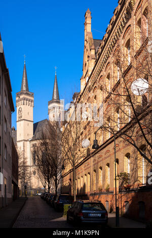 Germany, Cologne, the street Severinsmuehlengasse and church St. Severin in the district Suedstadt.  Deutschland, Koeln, Severinsmuehlengasse und Kirc Stock Photo