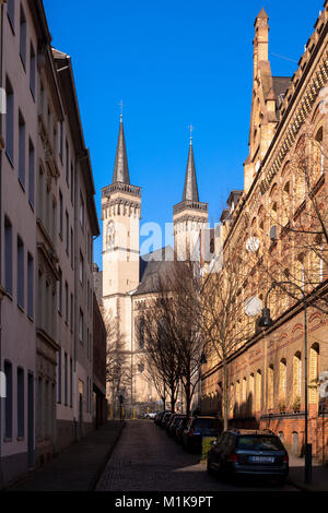 Germany, Cologne, the street Severinsmuehlengasse and church St. Severin in the district Suedstadt.  Deutschland, Koeln, Severinsmuehlengasse und Kirc Stock Photo