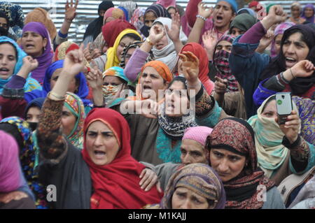 Local Women Chanting Pro freedom Slogans During The Funeral Of 19 Year Old Rayees Ganaie In Southern District Shopian Of Indian Administered Kashmir. Stock Photo