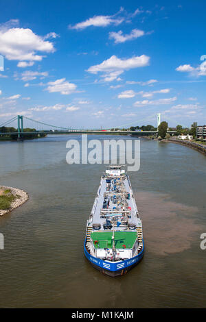Germany, Cologne, tanker arrives the harbor in the district Muelheim, in the background the Muelheimer bridge across the river Rhine.  Deutschland, Ko Stock Photo