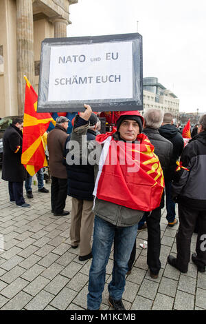 Macedonians living in Berlin staging a peaceful protest to demonstrate disapproval of Macedonian government policies and calling for nation unity Stock Photo