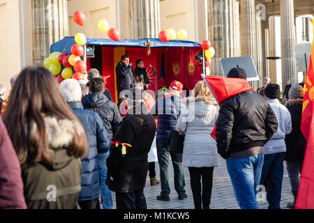 Macedonians living in Berlin staging a peaceful protest to demonstrate disapproval of Macedonian government policies and calling for nation unity Stock Photo