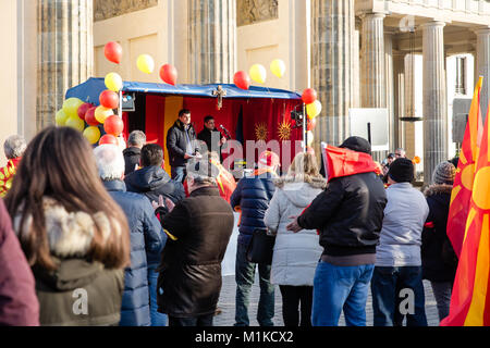 Macedonians living in Berlin staging a peaceful protest to demonstrate disapproval of Macedonian government policies and calling for nation unity Stock Photo