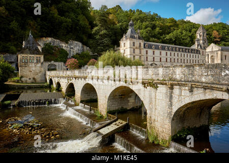 The Benedictine Abbey of Brantome and the Coude bridge over the River Dronne in Brantome, Dordogne France. Stock Photo