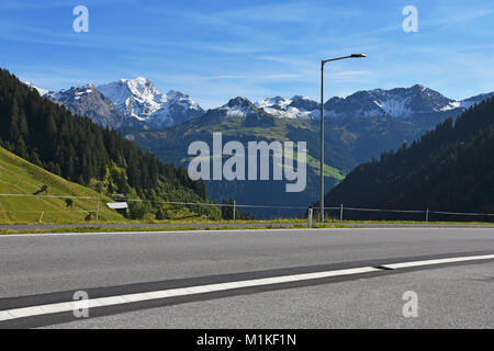 View from Faschinajoch pass road at a sunny day to Rote Wand mountain. Vorarlberg, Austria Stock Photo