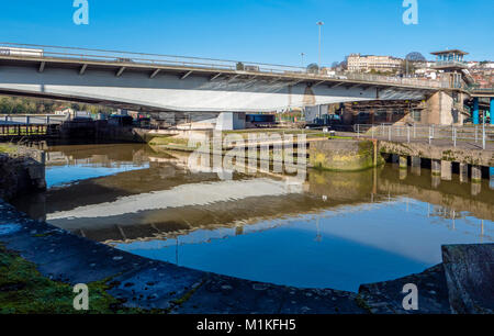 The Plimsoll swing bridge in Bristol Cumberland Basin takes traffic across the water whilst allowing boats to pass to and from the floating harbour Stock Photo