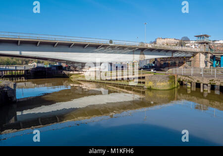 The Plimsoll swing bridge in Bristol Cumberland Basin takes traffic across the water whilst allowing boats to pass to and from the floating harbour Stock Photo