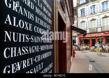 BEAUNE Jean-Luc Aegerter wine shop Burgundy wines listed on blackboard display outside entrance, Brasserie Carnot behind, Beaune, Côte d'Or, France Stock Photo