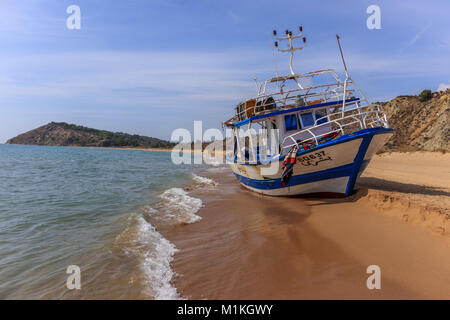 Boats left on the beach after landings of illegal immigrants in Torre Salsa Stock Photo