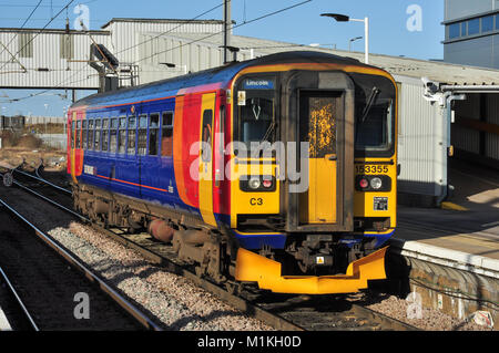 East Midlands Trains Class 153 single unit diesel railcar waits at Peterborough station with a train for Lincoln Stock Photo