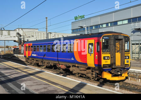 East Midlands Trains Class 153 single unit diesel railcar waits at Peterborough station with a train for Lincoln Stock Photo