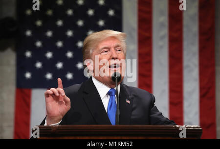 Washington, DC, USA. 30th Jan, 2018. U.S. President Donald J. Trump delivers the State of the Union address in the chamber of the U.S. House of Representatives January 30, 2018 in Washington, DC. This is the first State of the Union address given by U.S. President Donald Trump and his second joint-session address to Congress. Credit: Win Mc Namee/Pool Via Cnp/Media Punch/Alamy Live News Stock Photo