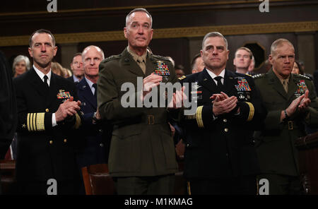 January 30, 2018 - Washington, District of Columbia, United States of America - WASHINGTON, DC - JANUARY 30: Chief of Naval Operations Adm. John Richardson (L-R), Chairman of the Joint Chiefs of Staff Gen. Joseph Dunford, Chief of Staff of the Army Gen. Mark Milley, and Commandant of the Marine Corps Gen. Robert Neller listen the State of the Union address in the chamber of the U.S. House of Representatives January 30, 2018 in Washington, DC. This is the first State of the Union address given by U.S. President Donald Trump and his second joint-session address to Congress. Credit: Win McName Stock Photo