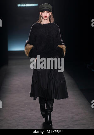 Barcelona, Spain. 31st Jan, 2018. A model showcases designs by Lola Casademunt on the show during 080 Barcelona Fashion Fall/Winter 2018 at Recinte Modernista Sant Pau on January 30, 2018 in Barcelona, Spain. Credit: Victor Puig/Alamy Live News Stock Photo