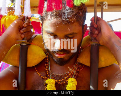 Kuala Lumpur, Malaysia. 1st Feb, 2018. One of the devotees is seen holding his kavadi as a ritual of Kavadi Attam on Thaipusam.Thaipusam is a holy festival celebrates by Tamil communities to commemorate the occasion when Parvati gave Murugan a ''˜vel' or spear to vanquish the devil demon, Soorapadman. The festivals are celebrated on the full moon in the Tamil month of ''˜Thai' that usually held on January or February. ''˜Kavadi attam' or known as Burden dance is the ceremonial sacrifice and offering performed by devotees during the worship of Murugan. (Credit Image: Credit: ZUMA Stock Photo