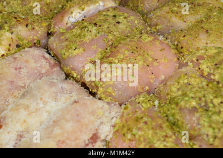 close up of chicken rolls still to be cooked Stock Photo