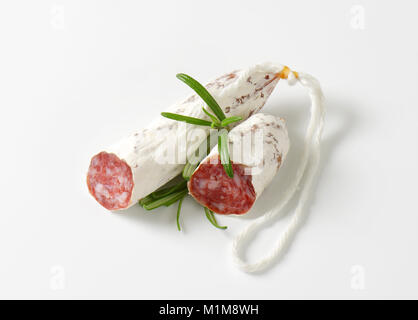 Spanish thin dried sausage of pork meat Stock Photo