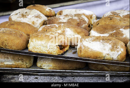 Stuffed sausage sandwich in restaurant, fast and insane food Stock Photo