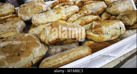 Stuffed sausage sandwich in restaurant, fast and insane food Stock Photo