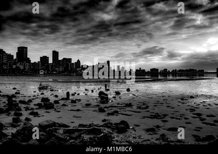 Dramatic harbor sunrise, black & white Stock Photo