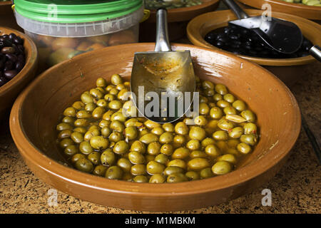 Olives with peppers and vinegar, food and appetizer Stock Photo