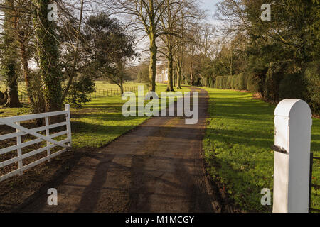 An image of the driveway leading to Wistow Hall, set in the rural countryside of Wistow, Leicestershire, England, UK. Stock Photo