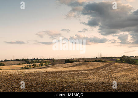 An image of farmland where the crops have been harvested and patterns created in the landscape shot near Tilton On The Hill, Leicestershire, England,  Stock Photo