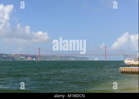 Ponte 25 de Abril suspension bridge in the distance crossing the river Tagus, Lisbon, Portugal Stock Photo