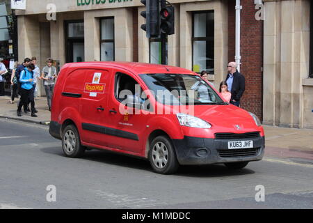 A RED PEUGEOT ROYAL MAIL DELIVERY VAN IN YORK Stock Photo