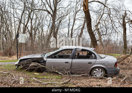 An abandoned car that was wrecked in an accident Stock Photo