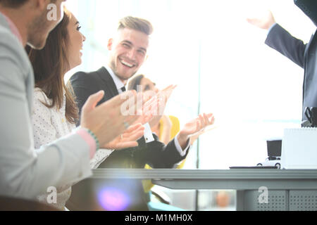 Photo of partners clapping hands after business seminar. Professional education, work meeting, presentation or coaching concept Stock Photo