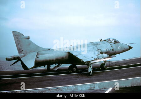 AJAXNETPHOTO. 1982. AT SEA, ENGLISH CHANNEL.  - HMS INVINCIBLE - A SEA HARRIER ON THE RAMP OF THE CARRIER AS IT HEADS OUT OF THE ENGLISH CHANNEL. PHOTO: VIV TOWNLEY/AJAX REF:22412 2 13 Stock Photo