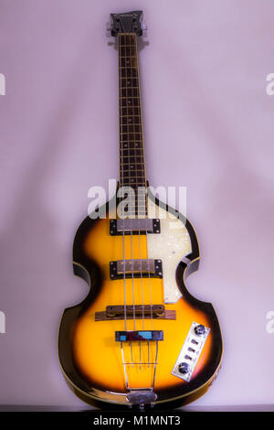 Beatles / Beatle violin bass guitar. Original models of this iconic shape instrument were introduced in the 1950s, with replicas like this still made. Stock Photo