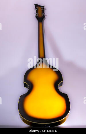 Beatles / Beatle violin bass guitar. Original models of this iconic shape instrument were introduced in the 1950s, with replicas like this still made. Stock Photo