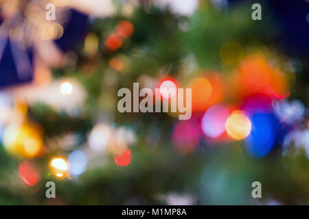 Abstraction of Christmas tree decoration with blurry defocused lights Stock Photo