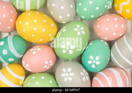 Full background of colorful, pastel, hand painted Easter eggs Stock Photo