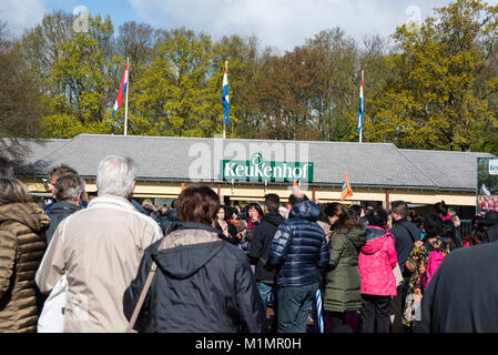 Visitors queuing at the main Keukenhof  main visitors entrance, Lisse in the south of Holland.    The name, ÔKeukenhofÕ meaning Kitchen garden created Stock Photo