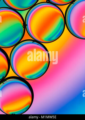 Abstract image of oil droplets  in water with colorful background. Stock Photo