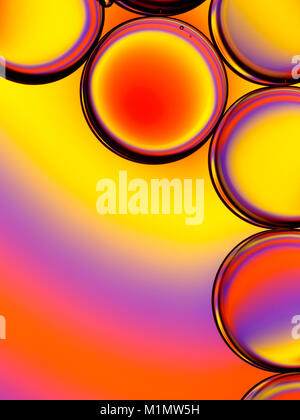 Abstract image of oil droplets  in water with colorful background. Stock Photo