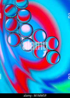 Abstract image of oil droplets  in water with colorful background. Stock Photo
